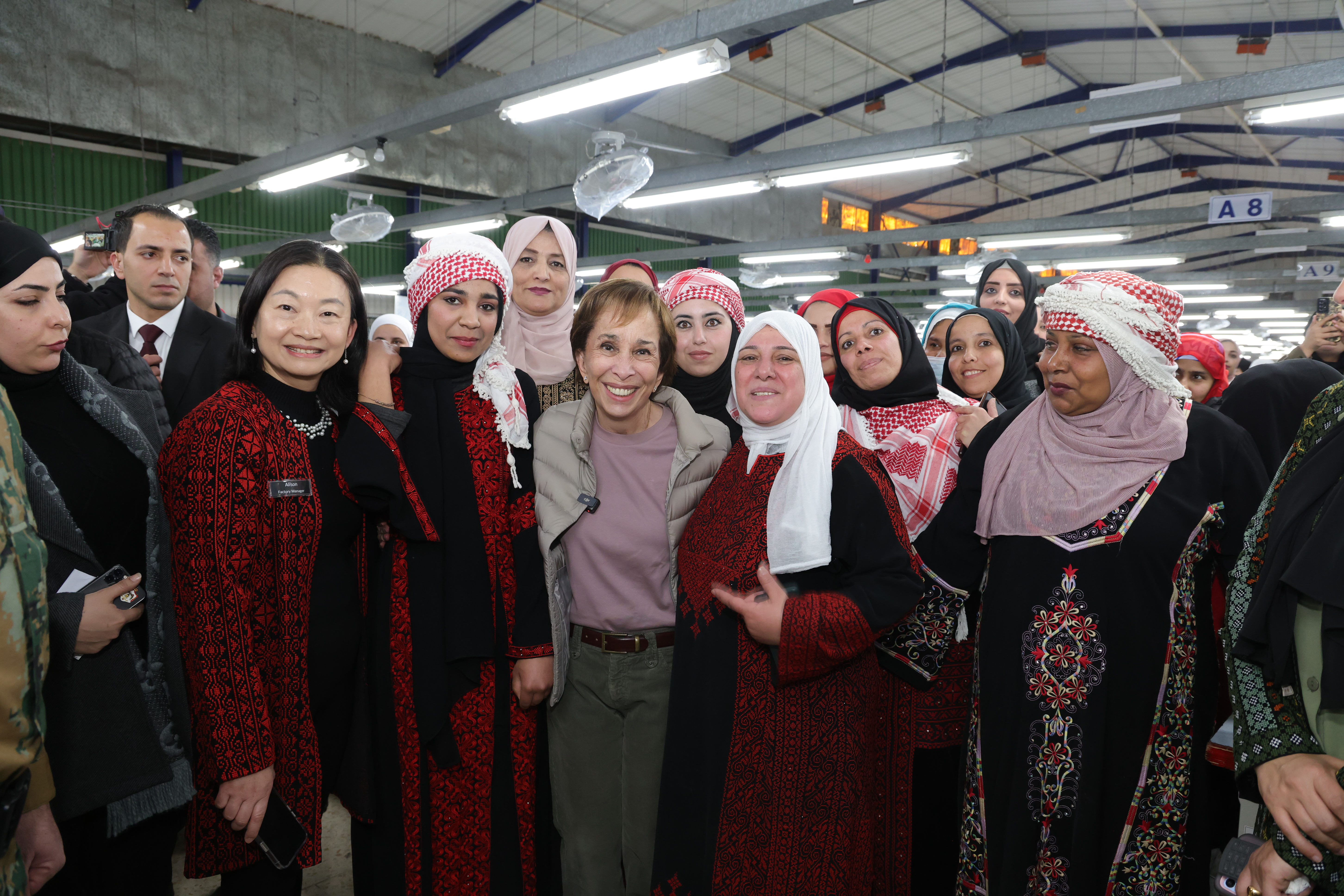 With Women from the Taiwanese Rich Pine garment factory in the Cyber City Industrial Zone